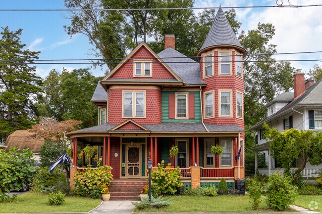 Queen Anne style homes tower over the streets of Newtown-North Division.
