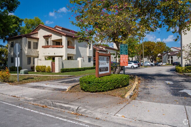 The entrance to Kenlands Bend South, a condo community within Kenland, welcomes residents with neatly landscaped grounds.