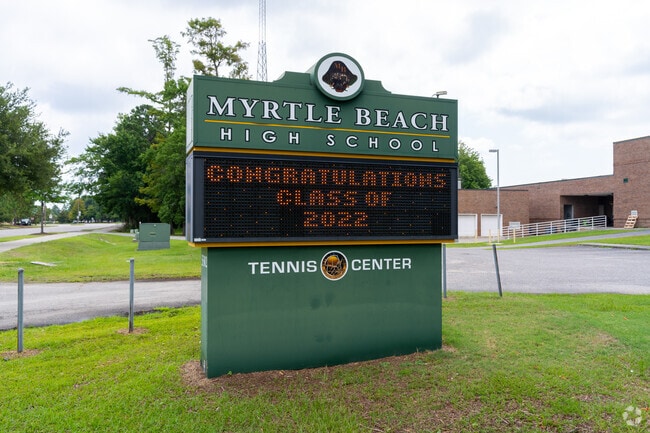 Myrtle Beach High School has a sign that shows upcoming events and congratulates students.