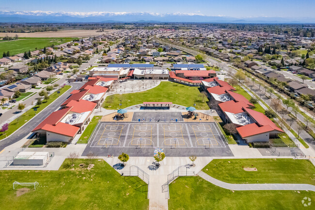 Basketball courts and playground at Shannon Ranch Elementary School in Visalia