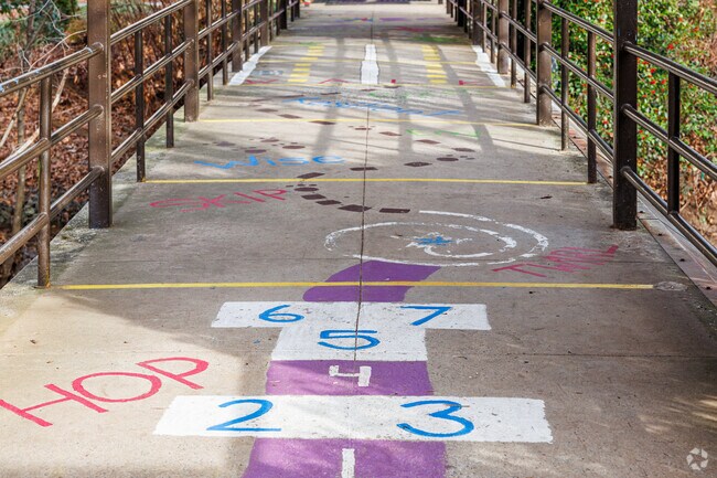 The entrance bridge of Brunson Elementary is decorated with welcoming paintings for students.