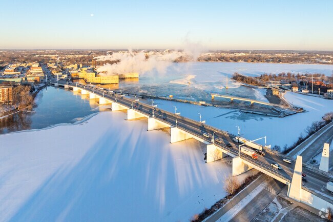 The city of De Pere is split between the Fox River, but connected by a central bridge.
