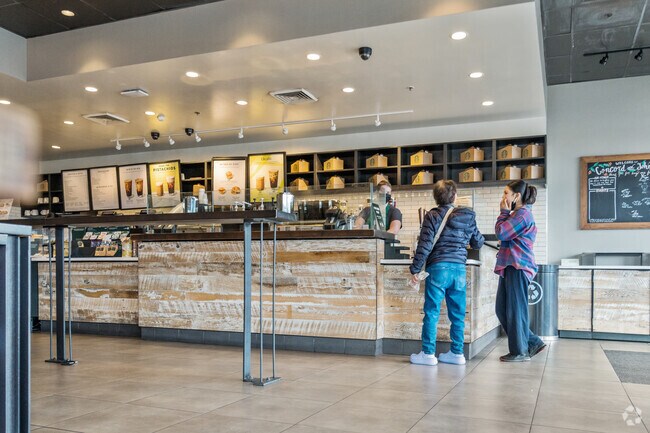 Queue forms at Starbucks for caffeine fixes near Pacheco.