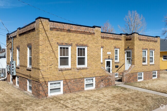 This early 20th-century brick apartment in Laramie blends historic charm with classic design.