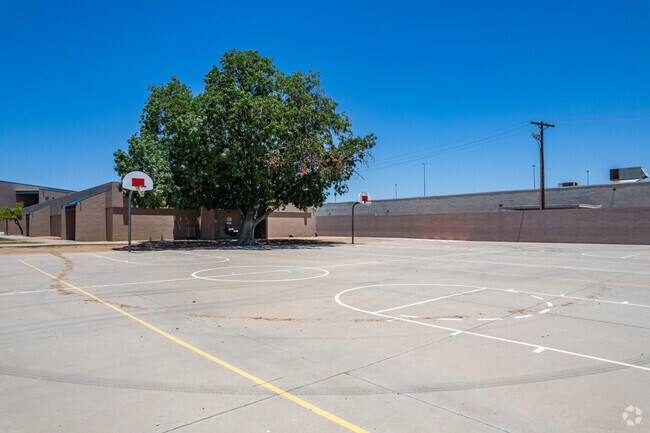 Shoot hoops on the basketball court at Washington Elementary in Phoenix.