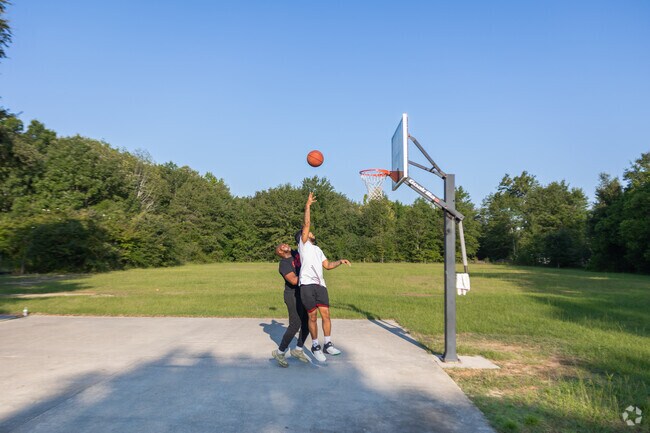 Crosswell residents meet friends at the Riley Park basketball court to play some basketball.