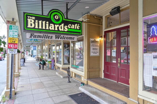The Billiards Café sign is located on the historic Main St of Ayer.