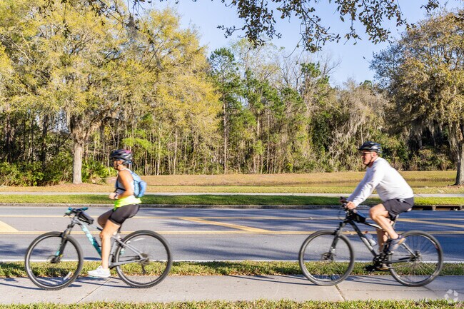 Ride bikes to the stores in St Johns.
