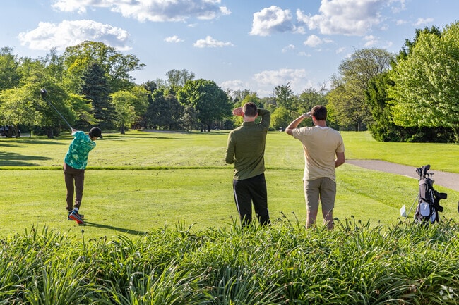 Locals hit the links at the Fairways of Woodside in Lisbon.