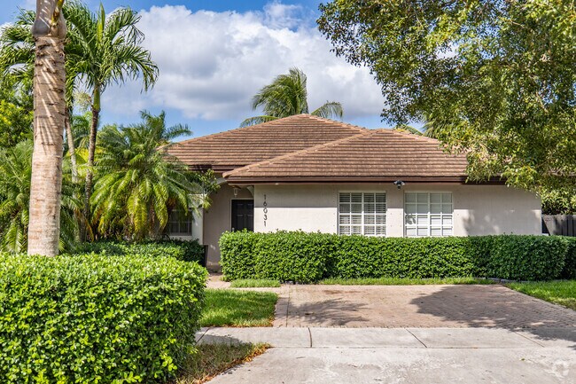 Find your own paradise in your new Spanish-revival style home in The Hammocks.