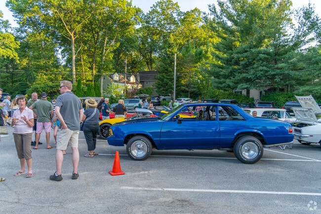 People come to explore the lineup at Fun Friday Classic Car Show.