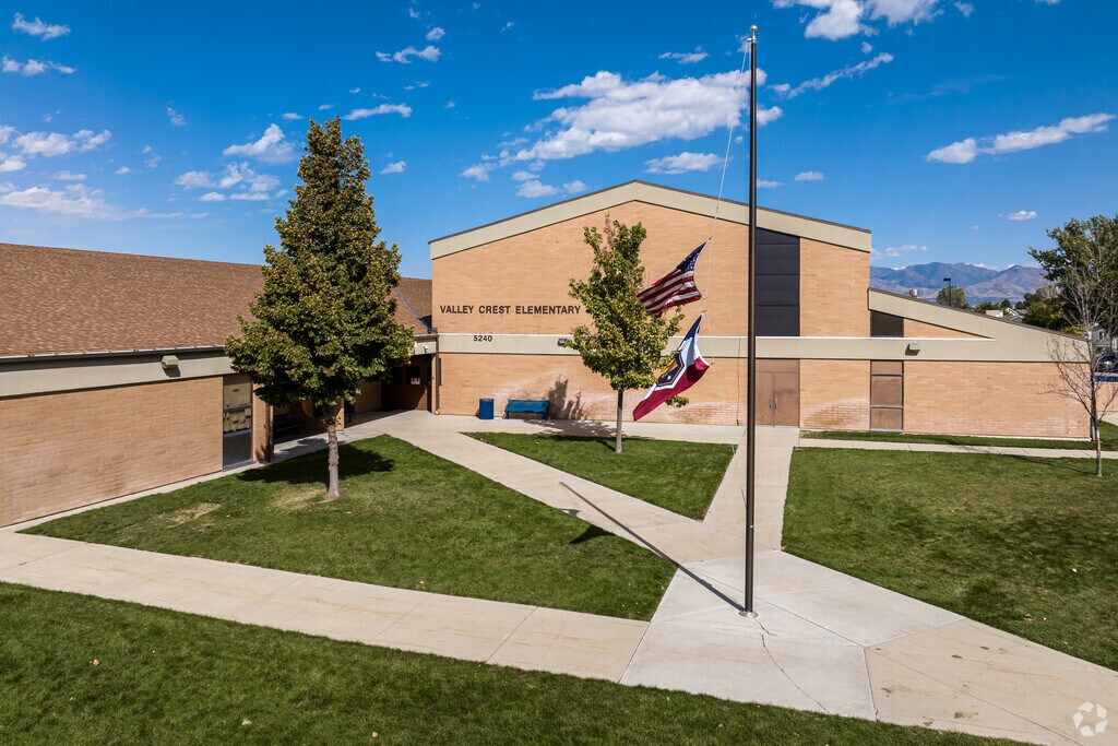 The peach terracotta bricks at Valley Crest Elementary School contrast beautifully with an azure