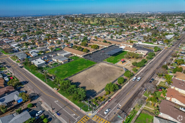 Castle Park Elementary School shows the open playing field, the buildings, and nearby areas.