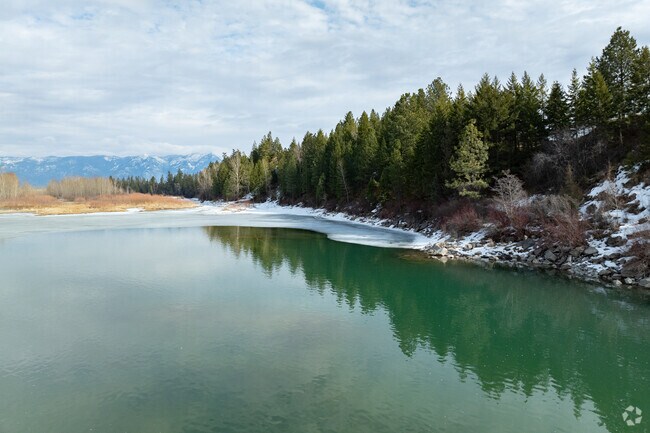 The Flathead River flows past Kalispell into Flathead Lake where fishermen and adventure await.