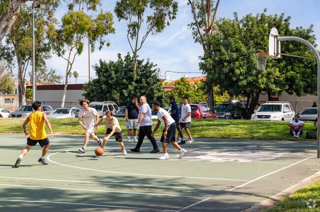 Play pick-up basketball at Wilson Park in Central Torrance, CA.