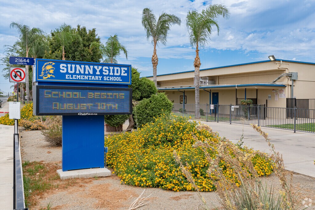 Blue marquee outside the entrance to Sunnyside Elementary School.