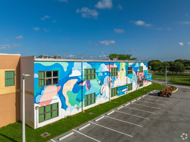 Whispering Pines Elementary School features a colorful mural.