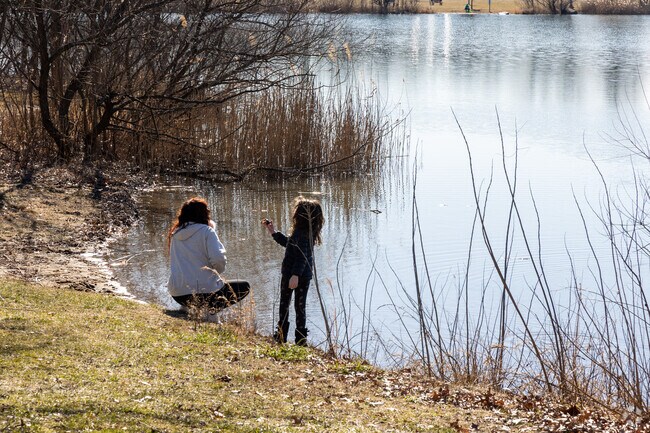 Falls Township Community Park spreads out over 14 acres with spaces for walking, hiking, a playground, and lake activities.