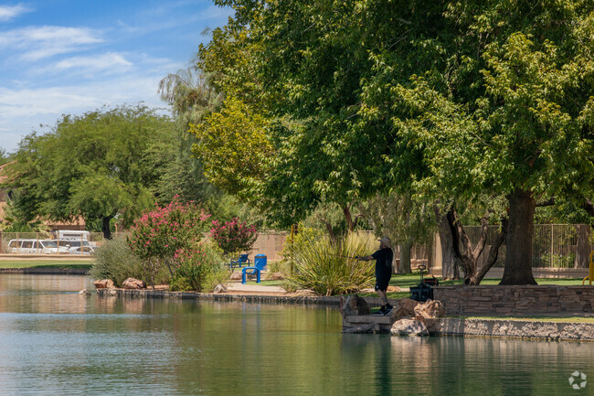 Residents enjoy fishing at the Rancho Sahuarita Lake during the summer.
