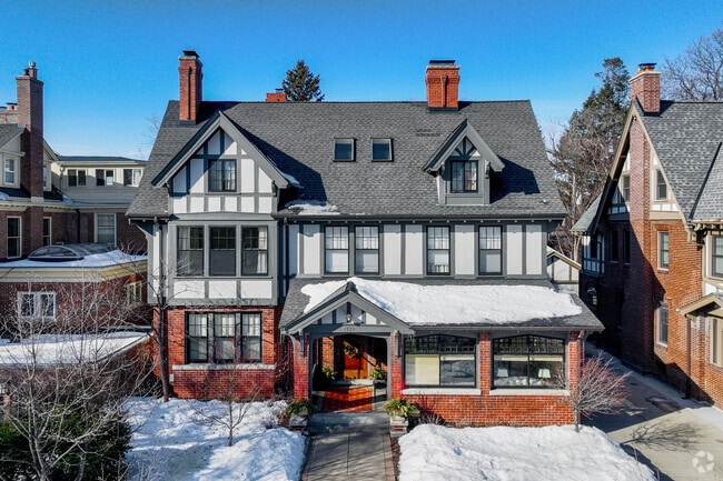 Tudor brick homes with three stories are in Lowry Hill.