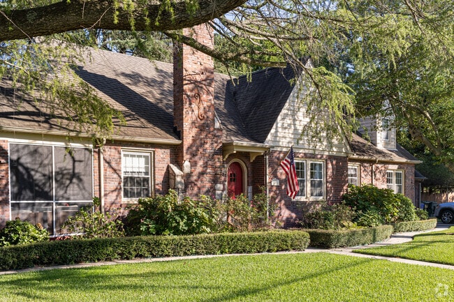 Brick Tudor homes with manicured lawns, stand out in Cromwell Farm.