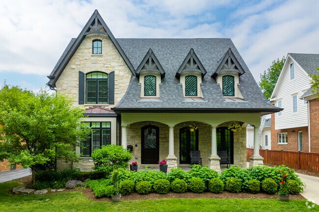 French Colonial homes with Tudor influences are common throughout South Hinsdale.