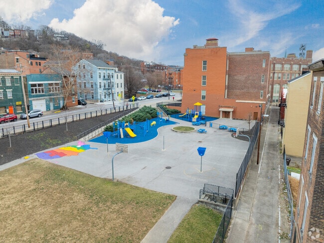 Students enjoy recess on the playground.