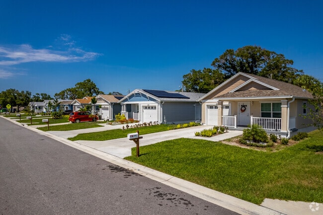 West Lealman is full of colorful homes with lush green lawns.
