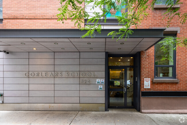 There are two teachers per classroom at Corlears School.