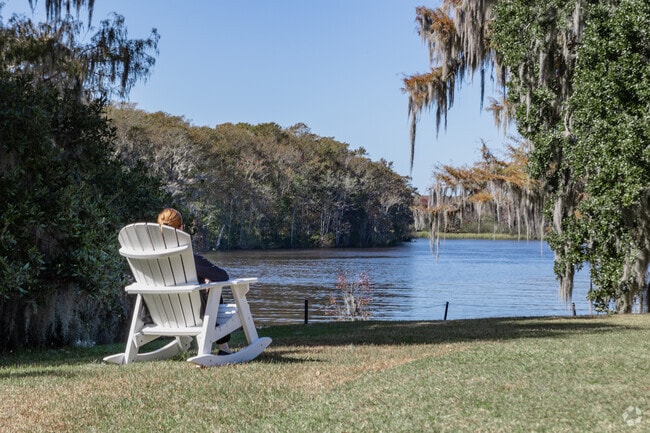 Relax in a chair and enjoy the beauty of the Waccamaw River at Wachesaw Plantation.