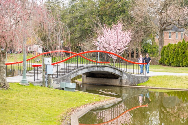 Walk across the Italian style bridge with a loved one at Italian Lake Park in Uptown Harrisburg.