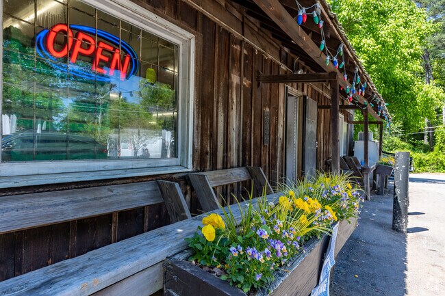 The the neighborhood's landmark Mount Paran Country Store shows its spring colors.