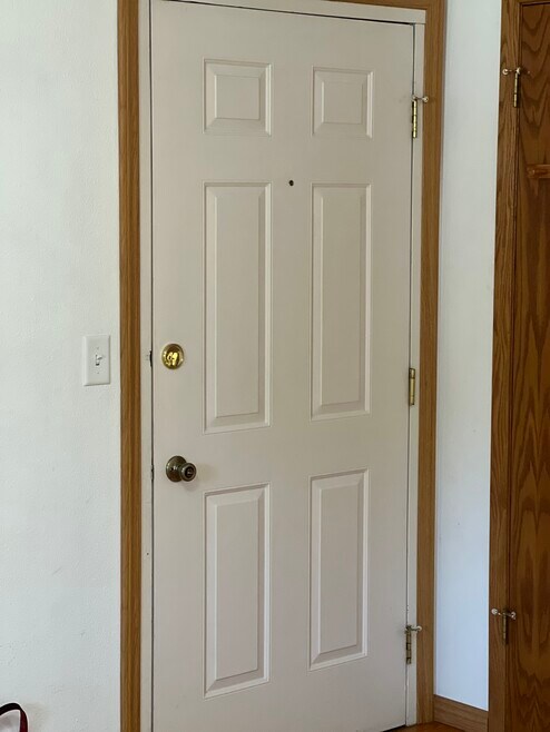 Front door to internal hallway of building