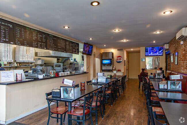 Dayton foodies enjoy pizza and beer at My Dad’s Place, a laid-back local favorite.