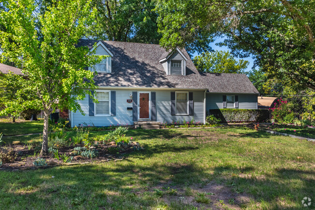 There a several Cape Code style home in the Indian Hills subdivision.
