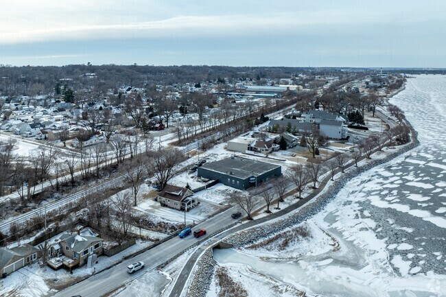 From above, East End shows its character—historic homes, industry, and the flowing Mississippi.