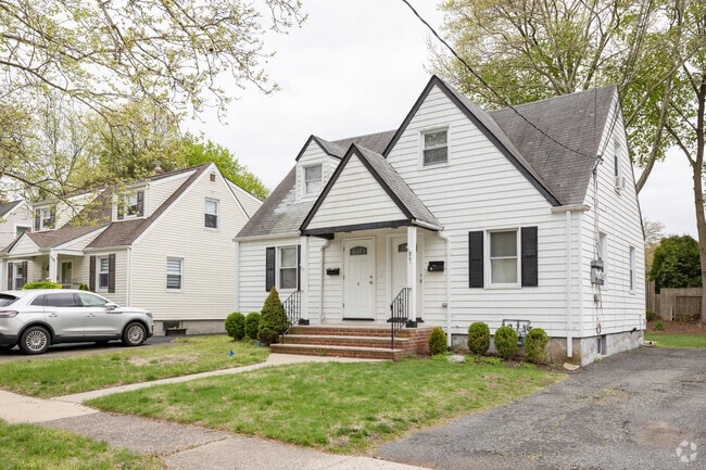 Colonial-style homes are common along tree-lined streets in Westwood.