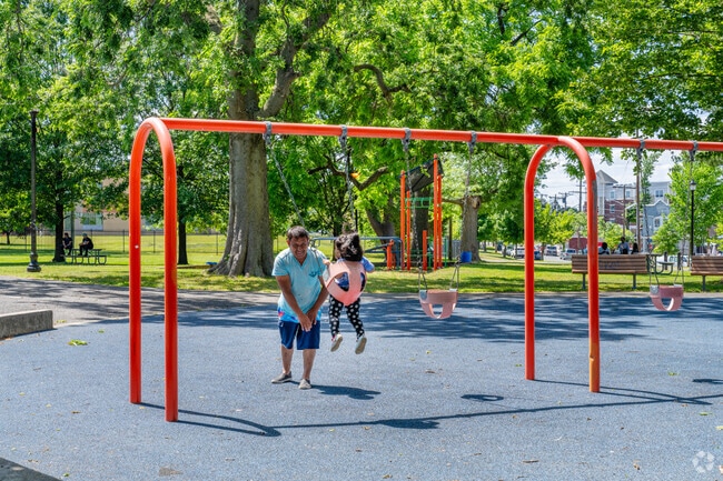 Stockton families bring their children to the playground at Dudley Grange Park.