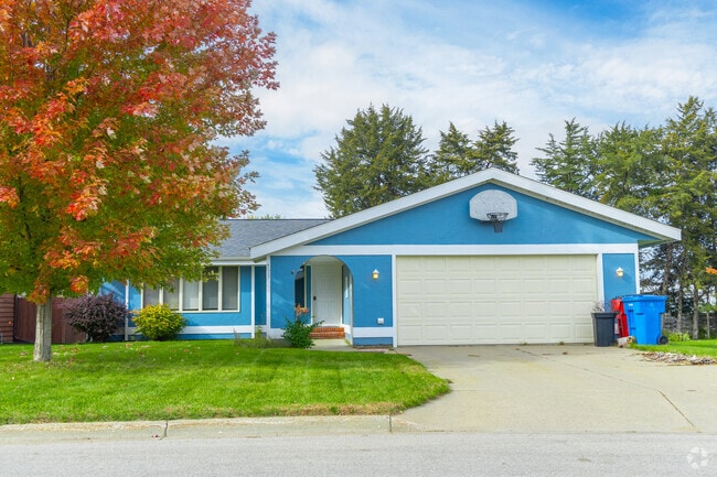 Many homes in Goodview have colorful exteriors and rounded arches.