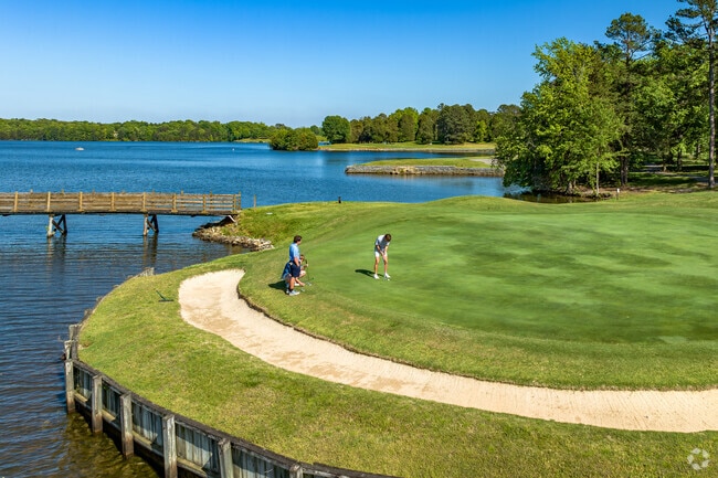 The Oak Hollow Golf Course offers stunning lake views along its course.