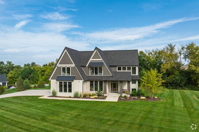 Credit River growth includes new builds while preserving wooded lots and lake access homes.