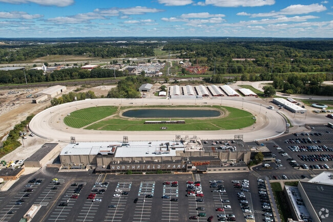 People from far and wide gather at the racetrack to place their bets on the thrilling races.