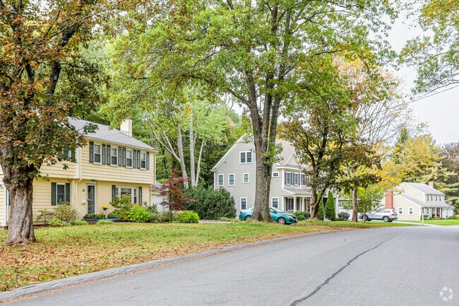 Colonial homes in Munroe Hill feature driveways and garages.