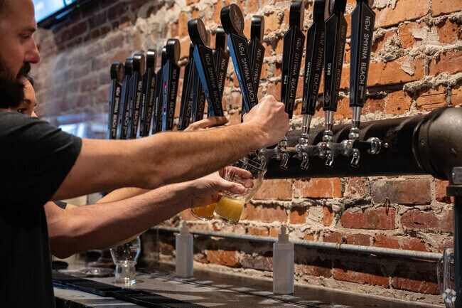 New Smyrna Beach Brewing Company brews local beers right on Canal St. in Southwest New Smyrna.