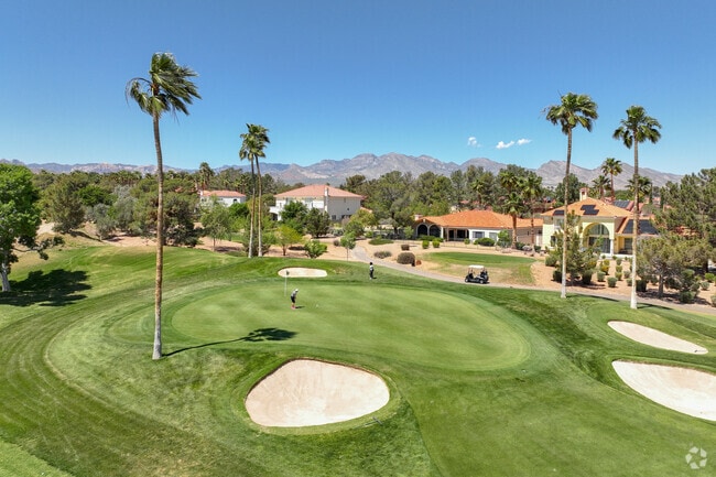 The Canyon Gate Country Club welcomes locals to putt in a vast golfing course.