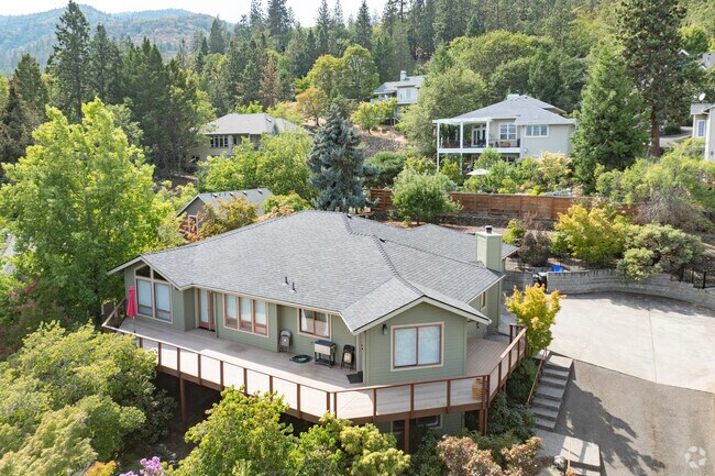Mid-century homes tuck up into the hills of the Northwest Ashland neighborhood.