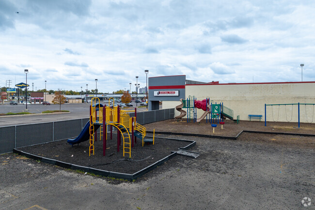 Central Point Preparatory Academy in Outer Greater Hilltop features a playground for children.