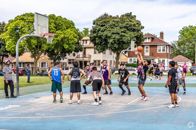 There is always a basketball game at Pulaski Park near Castle Manor.