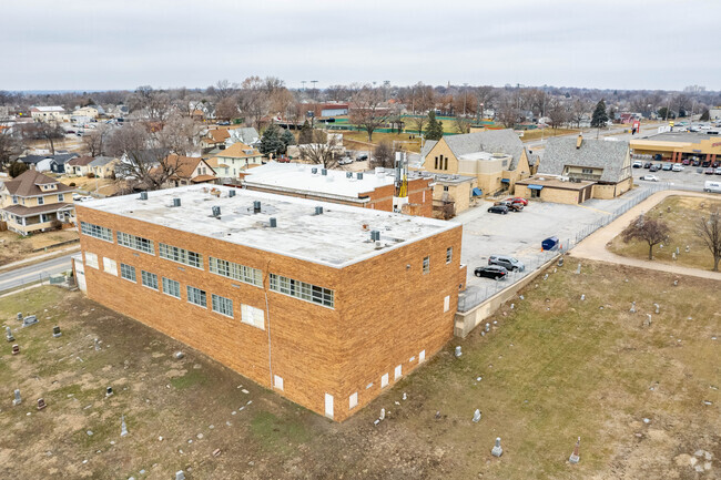 St. Peter Claver Christo Rey High School is located next to St Mary's Catholic Church.