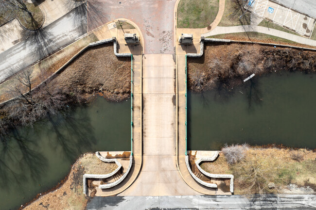 There is a small overpass over a moat near Island Park.